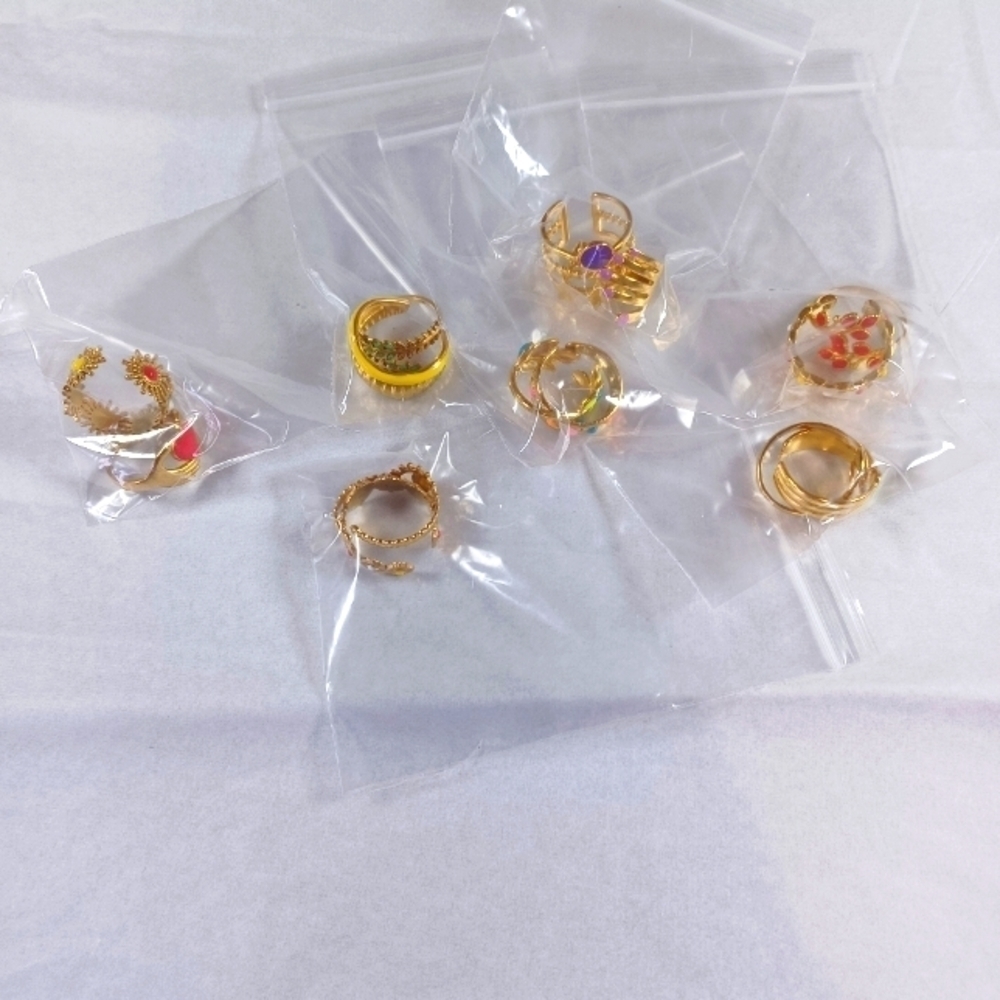 NWT.... Bundle of *14* Adjustable 18k Gold Plated Stainless Steel Rings